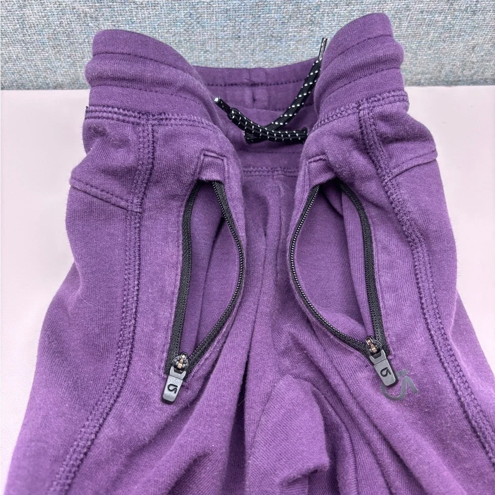 Set of Three 3T GAP Bottoms (1 Purple GapFit, 1 Pink Fleece, 1 Gray Short)